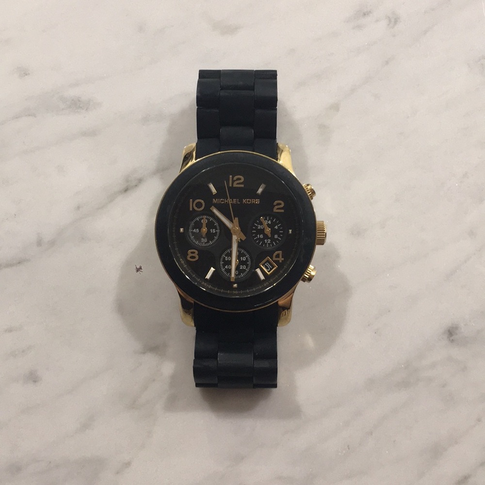 Michael Kors Black & Gold watch.